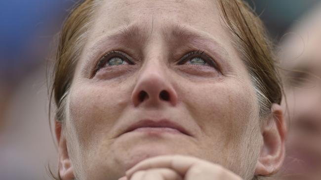 A woman cries during the funeral of the members of the Chapecoense Real football club team. The disaster could have been avoided, according to report. Picture: Douglas Mango/AP