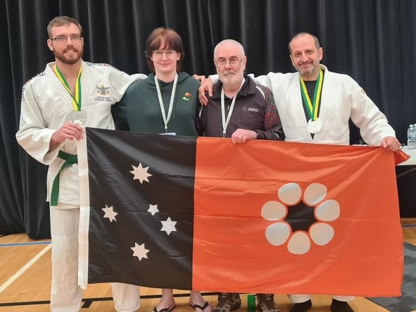 Kyle Mainey (left),  Alannah Joyce (second from left) and Elefterios Spyropoulos (right). Picture: Judo NT.