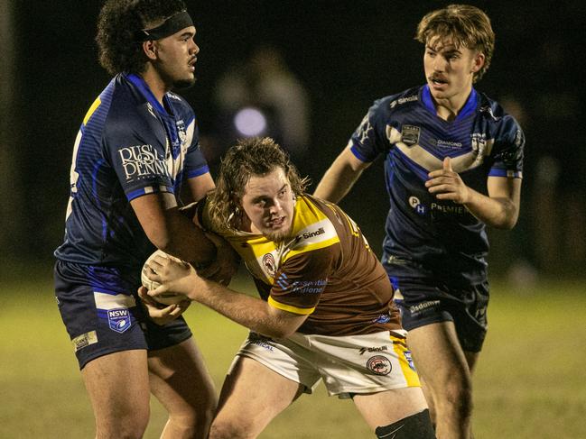 Rhys Falconer with the ball for Cambridge Park. Picture Julian Andrews.