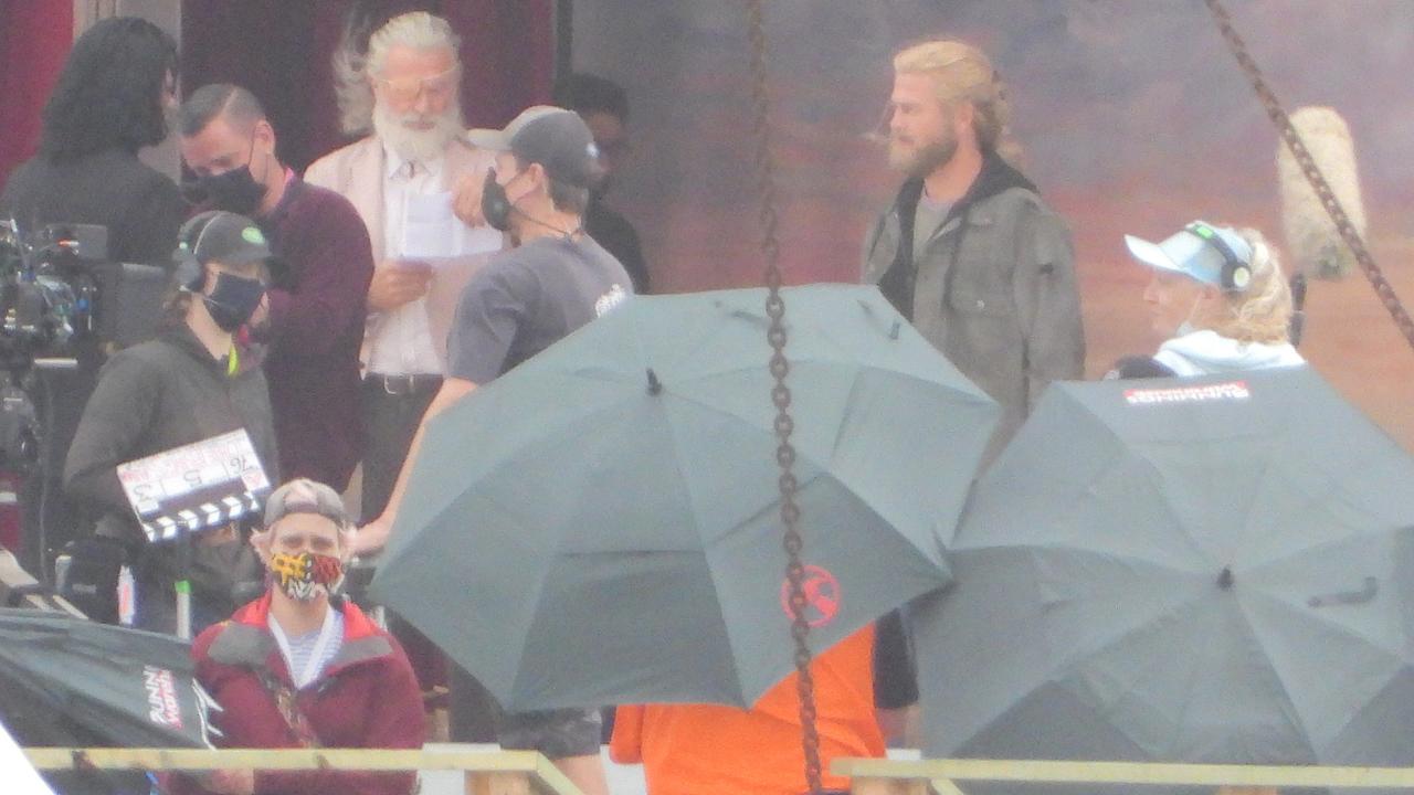 Sam Neill (top left in pink jacket) pictured on the set of Thor: Love and Thunder in Sydney having little idea of what’s going on. Picture: John Grainger