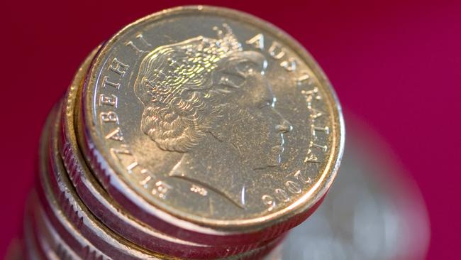 A large stack of Australian dollar coins.