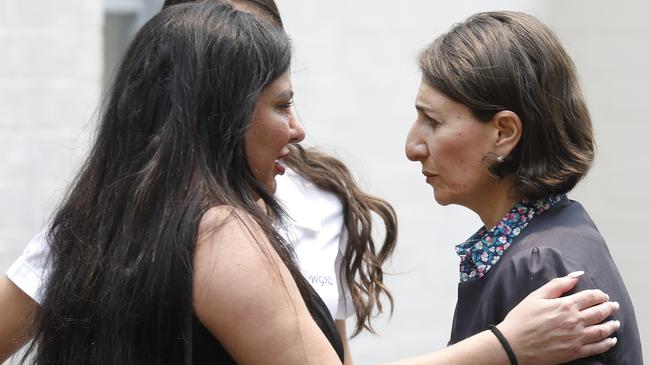 NSW Premier Gladys Gladys Berejiklian and a mourner. Picture: Chris Pavlich