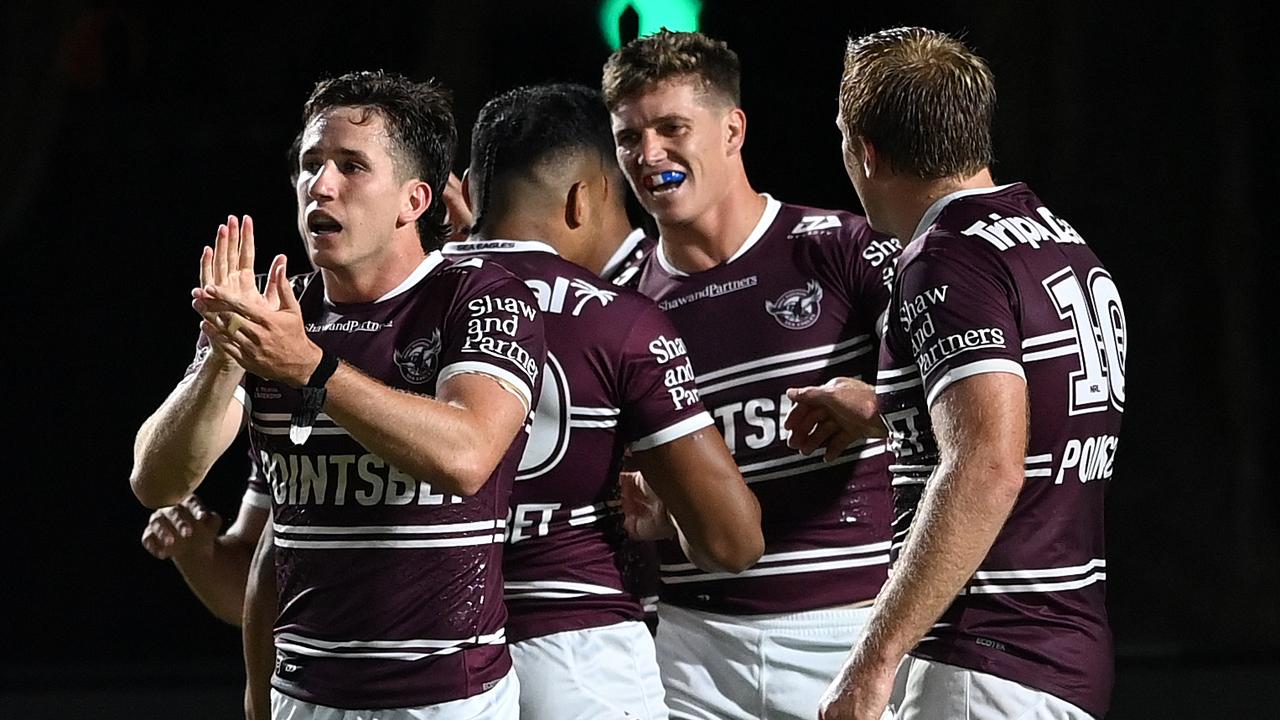 The Sea Eagles celebrate a try against the Roosters in the Pre-Season Challenge. NRL Imagery