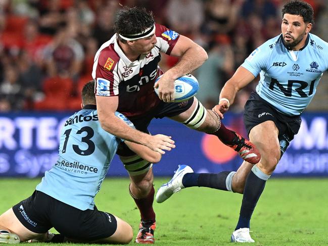 Queensland’s Ryan Smith gets an offload away. Picture: Getty Images