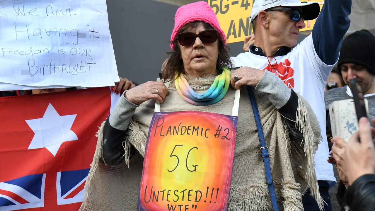 Anti-coronavirus lockdown protesters also held placards about 5G in Melbourne earlier this month. Picture: AFP