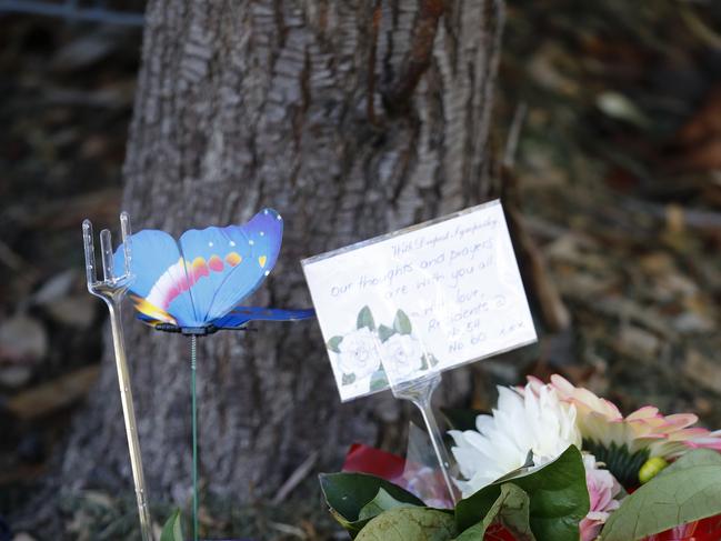 Flowers and cards left out the front of the Newmarch House. Picture: Sam Ruttyn