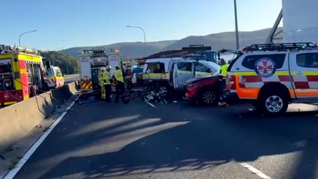 A driver was trapped and the road closed for more than an hour.