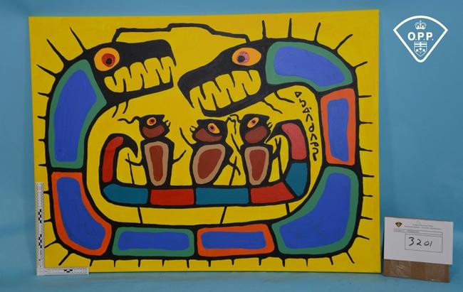 An evidence photo released by the Ontario Provincial Police of forgeries of Canadian Indigenous artist Norval Morrisseau's work