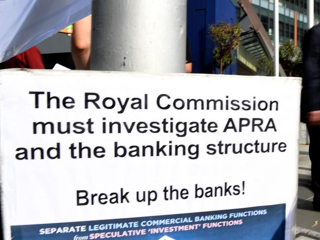 A photo taken in Melbourne shows a placard outside the royal commission set up in February to investigate misconduct in the banking sector. Picture: AFP