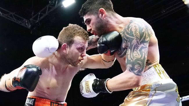 Jeff Horn (left) and Michael Zerafa during the ‘Battle of Bendigo’ in August. Picture: AAP