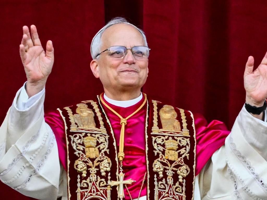 Newly elected Pope Leo XIV, Robert Prevost arrives on the main central loggia balcony of the St Peter's Basilica for the first time, after the cardinals ended the conclave, in The Vatican, on May 8. Picture: Alberto Pizzoli/AFP