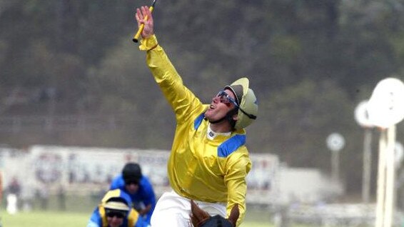 Oliver looks to his brother in heaven after winning the 2002 Melbourne Cup on Media Puzzle.