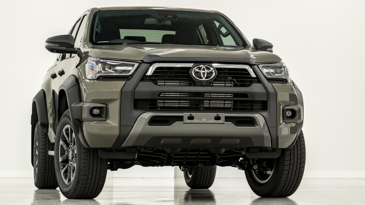 A tough-looking Toyota HiLux Rogue is just around the corner.