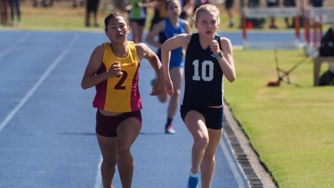 A champion has eyes for the line as St Margaret's Isabella Harte, right, comes up on the inside as the finish line approaches at last year’s QGSSSA meet. PICTURE: Louis Moore.