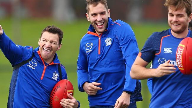 Harvey has fun with teammates at training. Picture: Getty Images