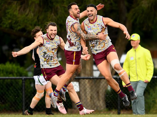 Steve Tolongs of Murrumbeena is congratulated by team mates after kicking a goal during the Southern Football Netball League 2023 Division 2 Senior match between Murrumbeena and Doveton Doves at Murrumbeena Park in Murrumbeena, Victoria on July 8, 2023. (Photo by Josh Chadwick)