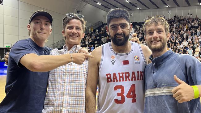 Hasan gets a photo with fans post-game. Picture: Supplied