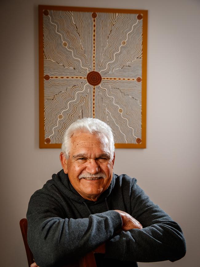 Sonny Morey at his Williamstown with the dot painting his sister Phyllis created. Picture Matt Turner