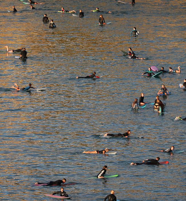 Dozens of surfers were pictured in the water. Picture: Matrix Media