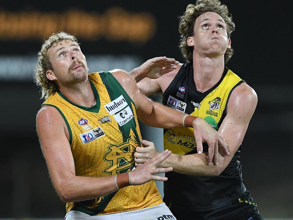 Nightcliff’s Ryan Nyhuis battles it out with St Mary’s forward Jackson Calder. Picture: Felicity Elliott/AFLNT Media.