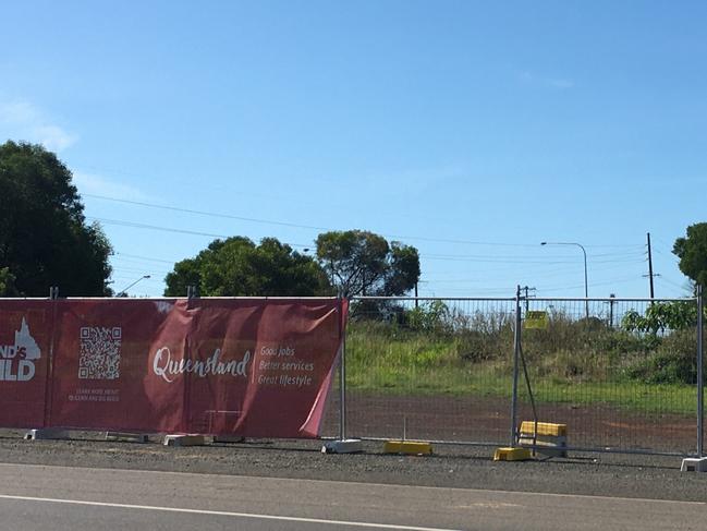 The Queensland Government banner adorned the fencing during the state election campaign but the only sign of work at the fire station site was a fresh mow.