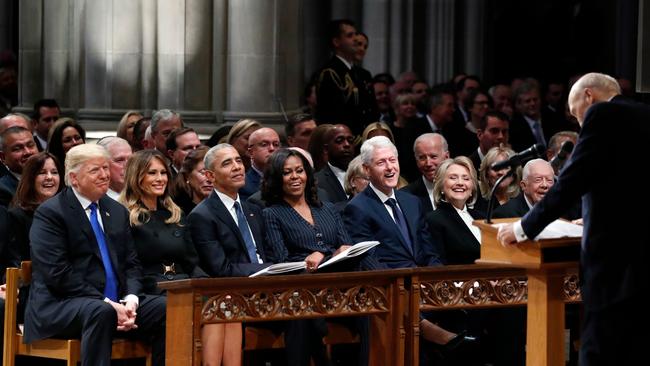 (L-R) US President Donald Trump, First Lady Melania Trump, former US President Barack Obama, Michelle Obama, former US President Bill Clinton, former Secretary of State Hillary Clinton, and former US President Jimmy Carter listen as former Sen. Alan Simpson, R-WY., speaks during a State Funeral Funeral former US President George H.W. Bush, at the National Cathedral in Washington, DC on December 5, 2018. (Photo by Alex Brandon / POOL / AFP)