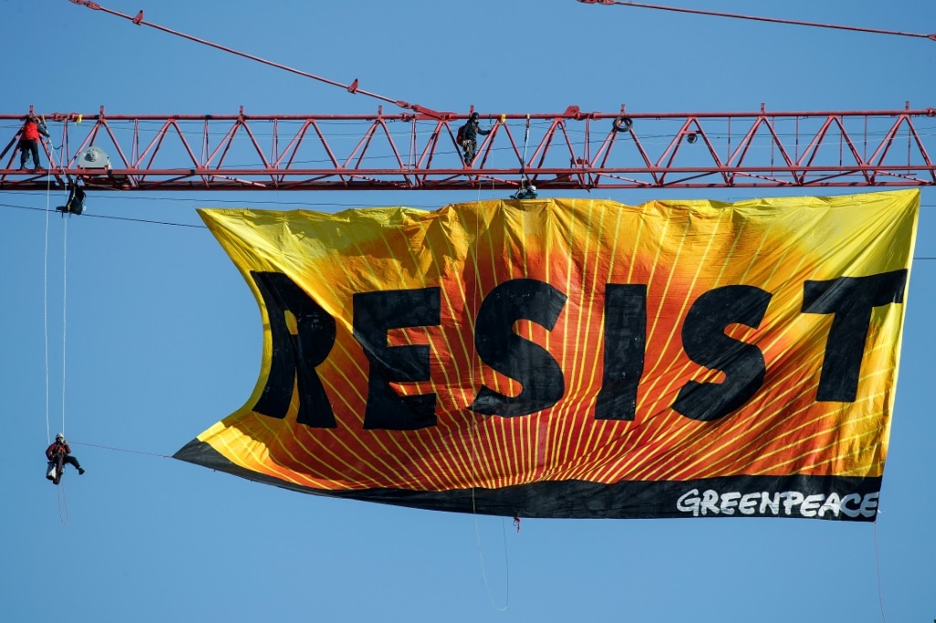 Greenpeace has vowed to continue its environmental work despite the ruling