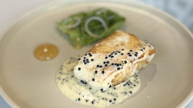 Patagonian toothfish with parsley sauce and black caviar at Blowfish Ocean Grill and Bar, Broadbeach.