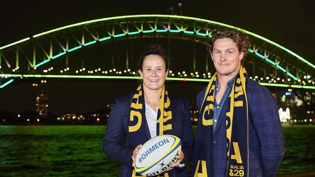 SYDNEY, AUSTRALIA – MAY 12: Michael Hooper (R) and Shannon Parry (L) pose for a photo in front of The Sydney Harbour Bridge, lit in support of Rugby Australia's 2027 &amp; 2029 Rugby World Cup Bids, on May 12, 2022 in Sydney, Australia. (Photo by Brett Hemmings/Getty Images for Rugby Australia)