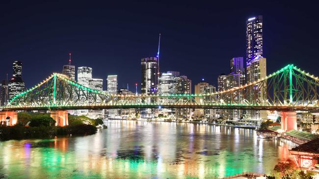 The Story Bridge lit up green and gold as Brisbane is named the host of the 2032 Olympic Games. Picture: Peter Wallis.