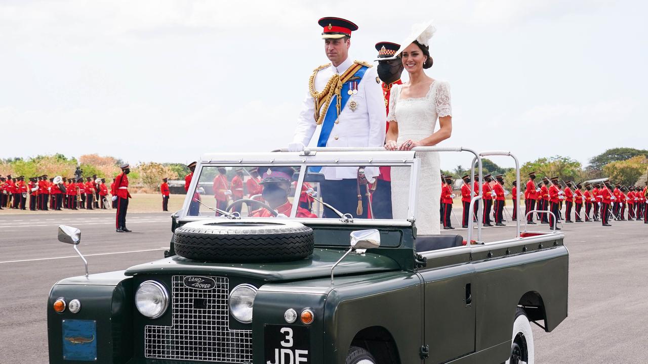 William and Kate view Jamaican troops from a Land Rover. Picture: Paul Edwards – Pool/Getty Images