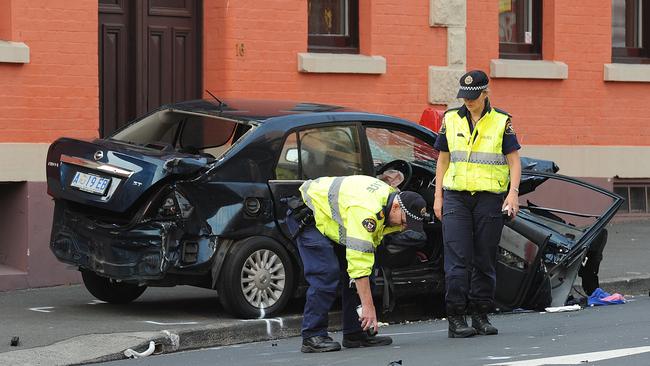 Police inspect the scene of the accident. Picture: SAM ROSEWARNE