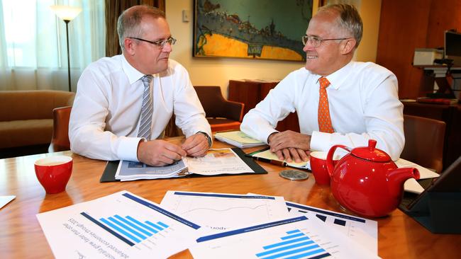 Treasurer Scott Morrison and PM Malcolm Turnbull looking over Budget papers. Picture: Kym Smith