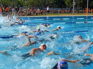 SWIM RELIEF: Swimmers took to the pool for the first part of the triathlon. Picture: Meg Gannon