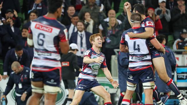 Nic Stirzaker and Jack Debreczeni of the Rebels celebrate at the fulltime whistle.