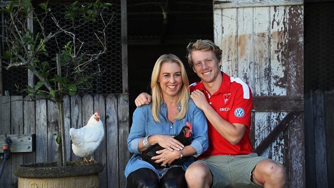 Callum Mills, 19 year old Sydney Swans rookie and local Sydney boy at the family property at Terry Hills with Simone his mother ahead of Mother’s Day this weekend. Picture. Phil Hillyard