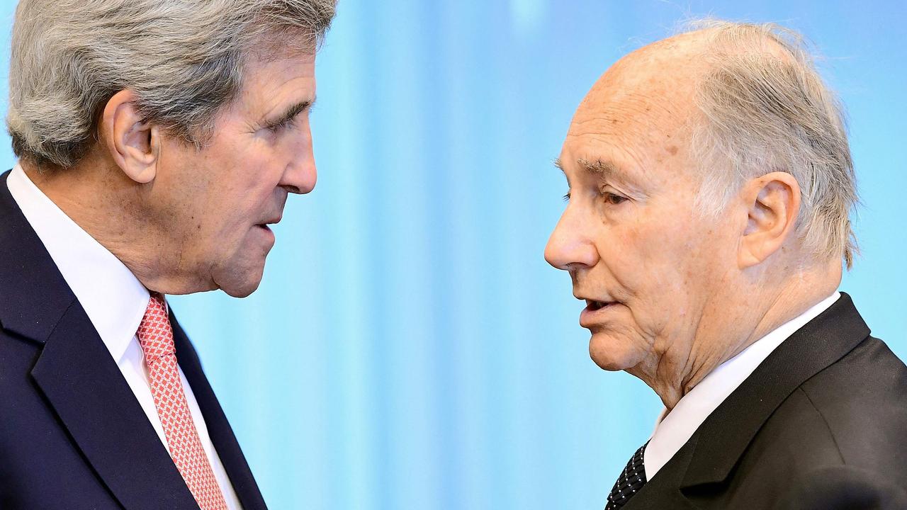 US State Secretary John Kerry (L) speaks with the Aga Khan (Prince Shah Karim Al Husseini Aga Khan IV) as they attend a conference on Afghanistan at the European Council in Brussels on October 5, 2016. Picture: AFP