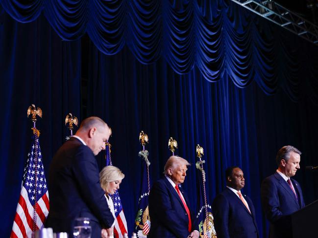 US President Donald Trump bows his head during the National Prayer Breakfast at the Washington Hilton. Picture: AFP