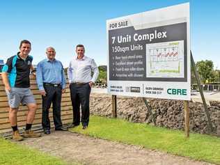 GOING UP: First Choice Constructions managing director Nick Lancaster, left, with Glen Grimish and Chris Sales at 17-19 Claude Boyd Parade, Bells Creek. Picture: Contributed