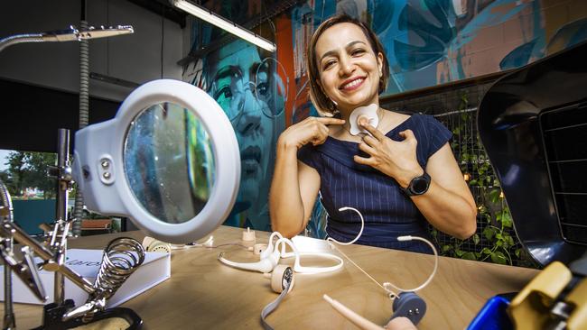 Dr Farzane Ahmadi with her invention the Laronix Voice Box. The device gives those who have lost their vocal cords due to cancer a voice. Picture: Nigel Hallett