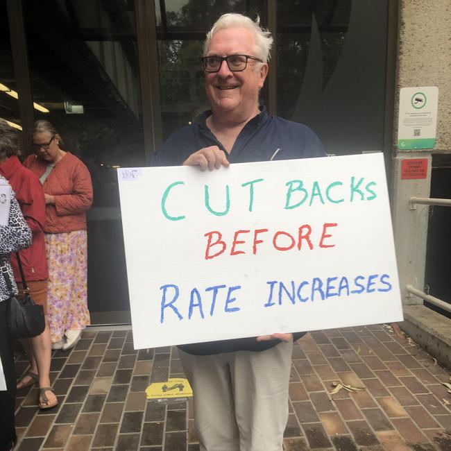 Stuart Gold, organiser of the ratepayer protest outside Northern Beaches Council Chambers at Dee Why on Tuesday night. Protesters are fighting a possible 40pc increase in rates. Picture: Supplied.