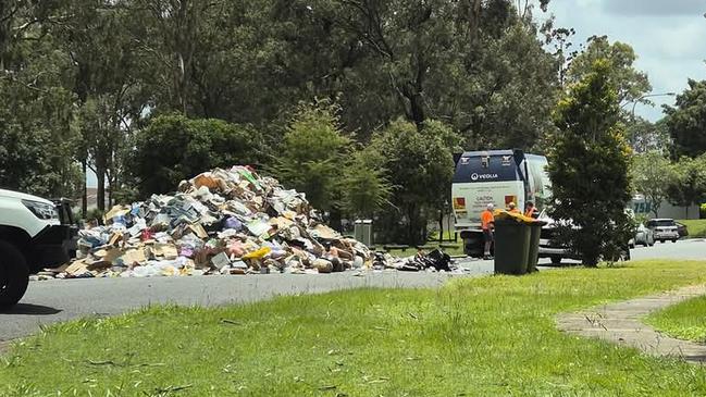 A Brisbane garbage truck collector was forced to dump the entire rubbish load after flammable objects caused an explosion inside the truck. Picture: Brenden Dillon Baker