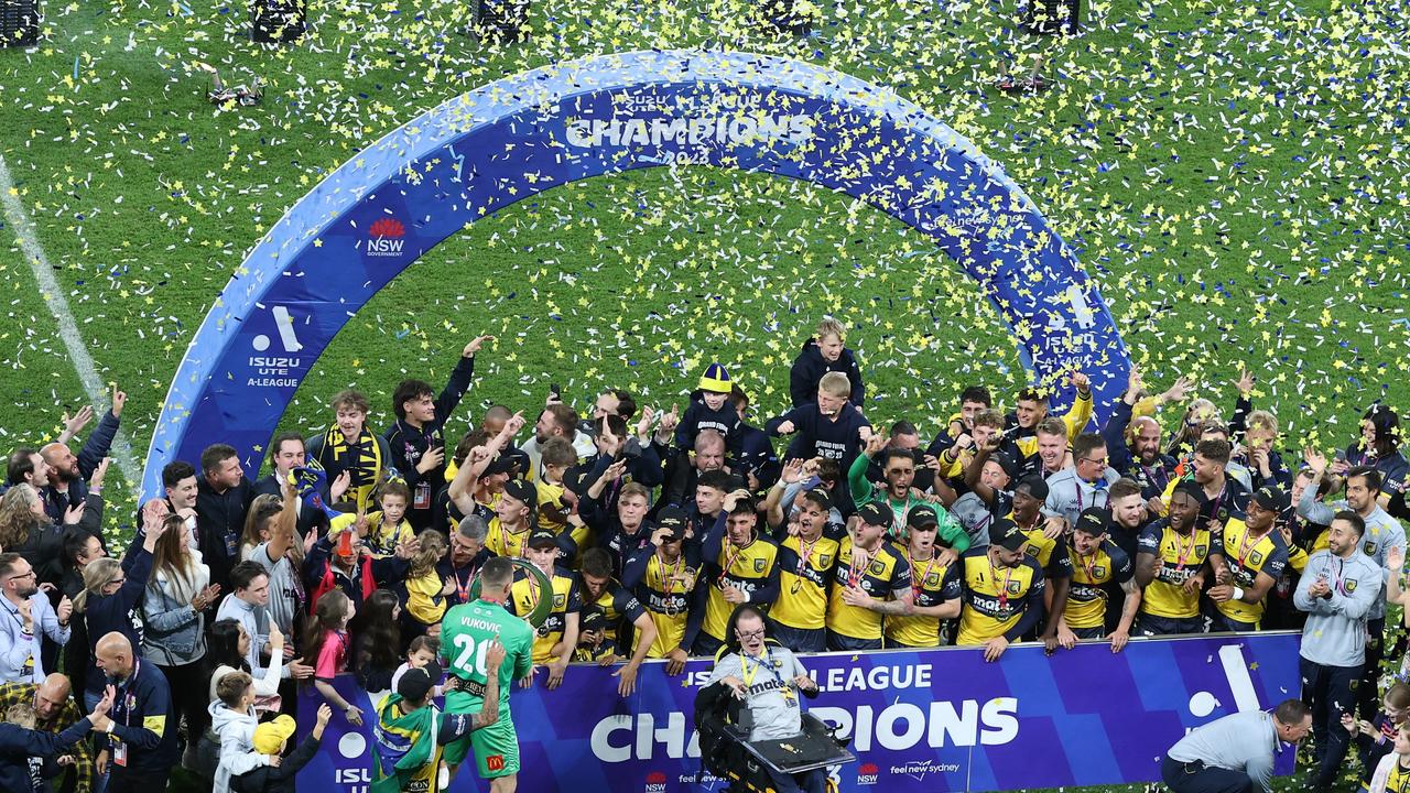 The Central Coast Mariners celebrate last year’s grand final win. Picture: Scott Gardiner/Getty Images)