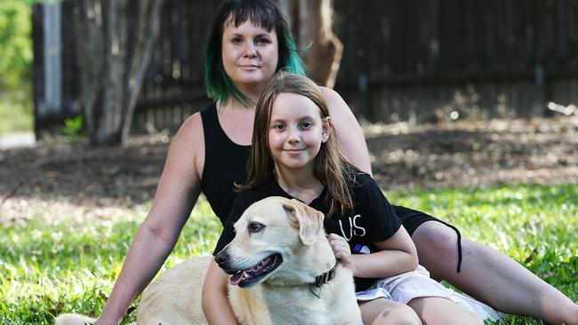 Jess Lynn, pictured with her eight-year-old daughter Izzy Oprey and her Labrador Charlie, has found a new home to live in after being homeless for the past six months last year. Picture: Brendan Radke