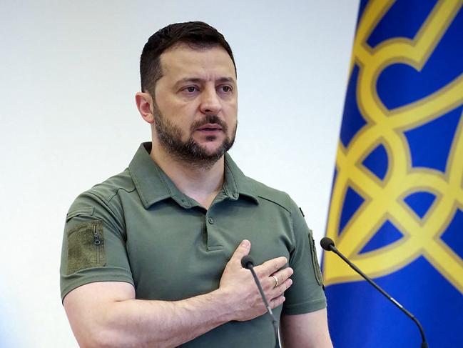 This handout photograph taken and released by the Ukrainian Presidential Press Service on July 2, 2023, shows Ukraine's President Volodymyr Zelensky attending a ceremony marking the Day of the Naval Forces in Odesa. (Photo by Handout / Ukrainian Presidential Press Service / AFP) / RESTRICTED TO EDITORIAL USE - MANDATORY CREDIT "AFP PHOTO / HANDOUT / UKRAINIAN PRESIDENTIAL PRESS SERVICE" - NO MARKETING NO ADVERTISING CAMPAIGNS - DISTRIBUTED AS A SERVICE TO CLIENTS