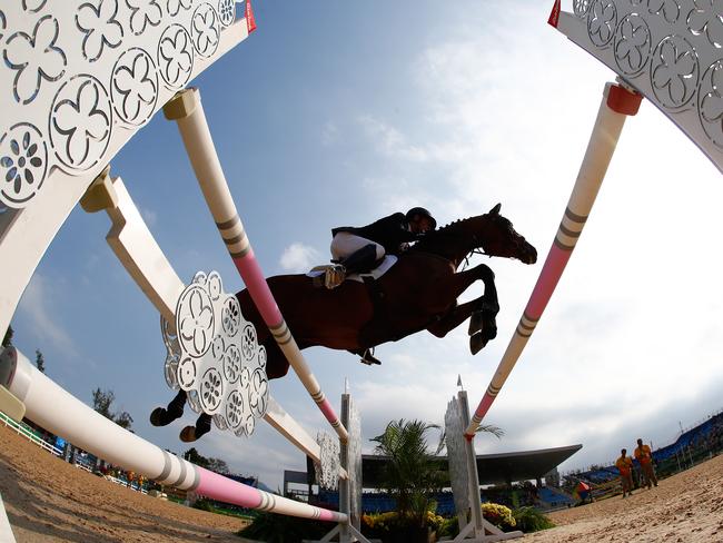 RIO DE JANEIRO, BRAZIL - AUGUST 09: Christopher Burton of Australia riding Santano Ii during the eventing team jumping final and individual qualifier on Day 4 of the Rio 2016 Olympic Games at the Olympic Equestrian Centre on August 9, 2016 in Rio de Janeiro, Brazil. (Photo by Jamie Squire/Getty Images)