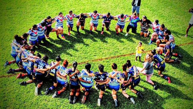 Players from the Innisfail Leprechauns and Edmonton Storm women's teams huddle following the death of Innisfail footballer Ailsa Satini. Picture: Facebook/ Innisfail Leprechauns RLFC