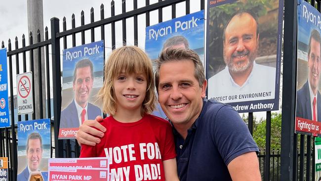 Labor Member for Keira Ryan Park and his son Oliver at Farmborough Road Public School on election day. Picture: Dylan Arvela