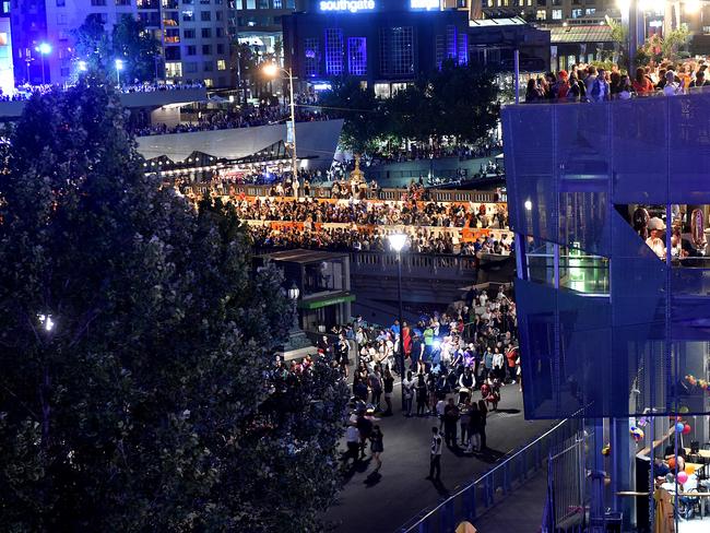 Crowds build up in Federation Square and along Princes Bridge. Picture: Jay Town