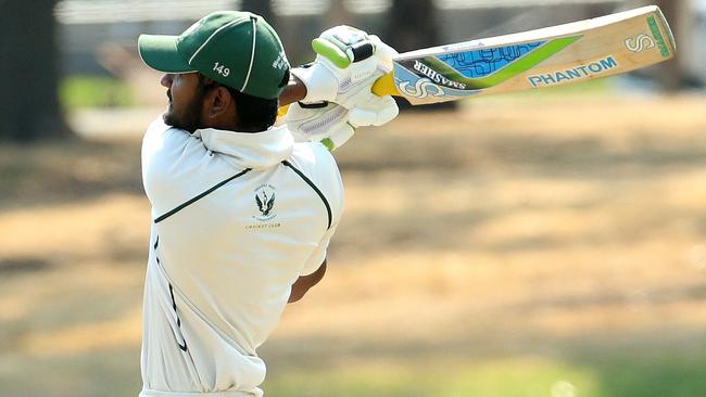 Isuru Okandage goes on the attack for Airport West St Christophers. Picture: Hamish Blair